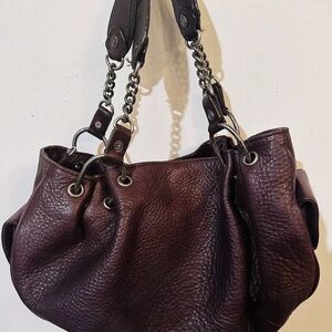 I have a used as NEW used only once. GORGEOUS VINTAGE JUICY COUTOUR handbag.